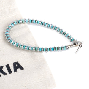 Mikia Hematite Roundel Bracelet Turquoise