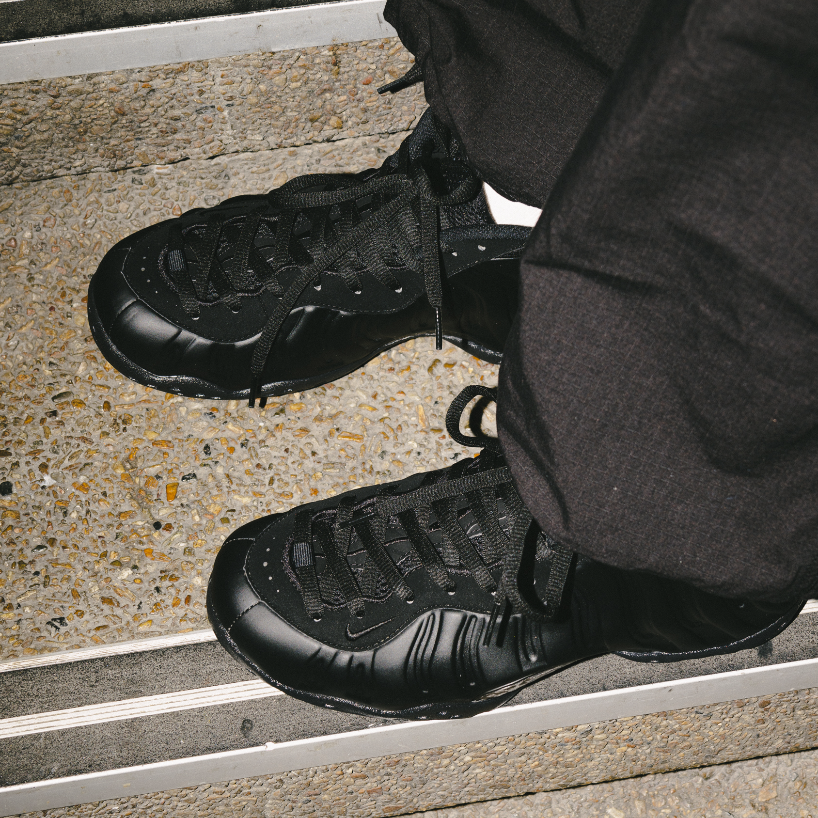 Triple black sales foamposites on feet
