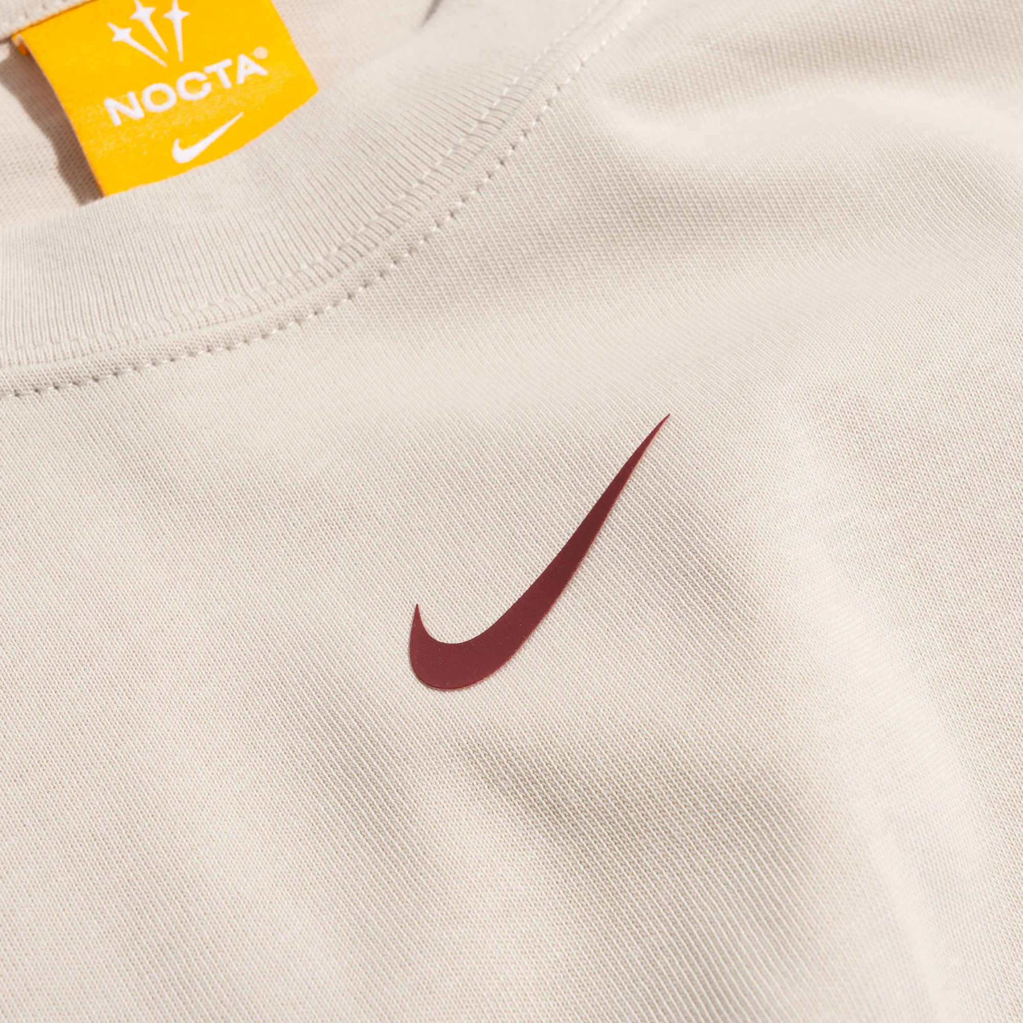 Nike NOCTA Men's NRG Cs Tee Lt Orewood Brn/Team Red IB5673-104