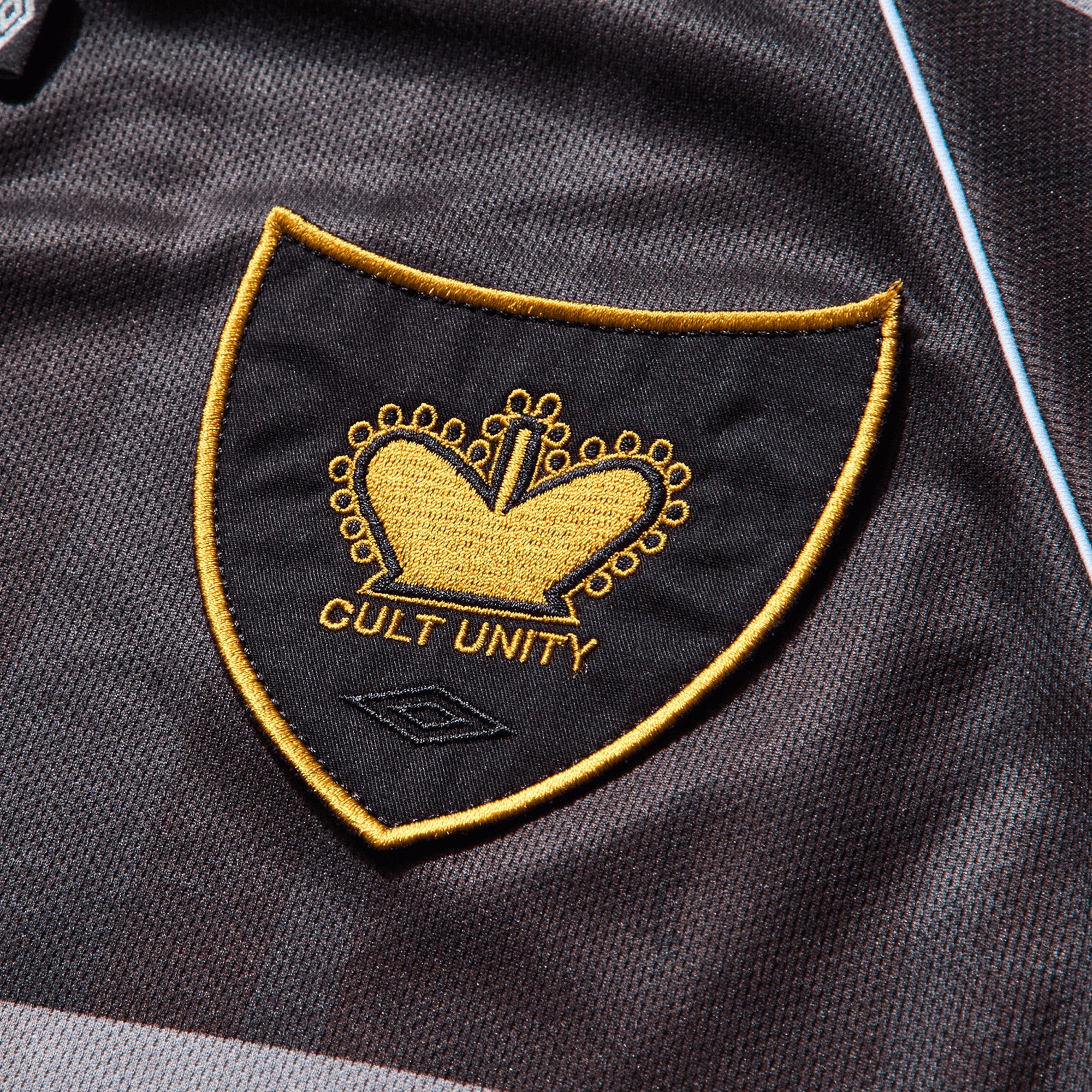 Umbro Distressed Spycam Polo Purple Black