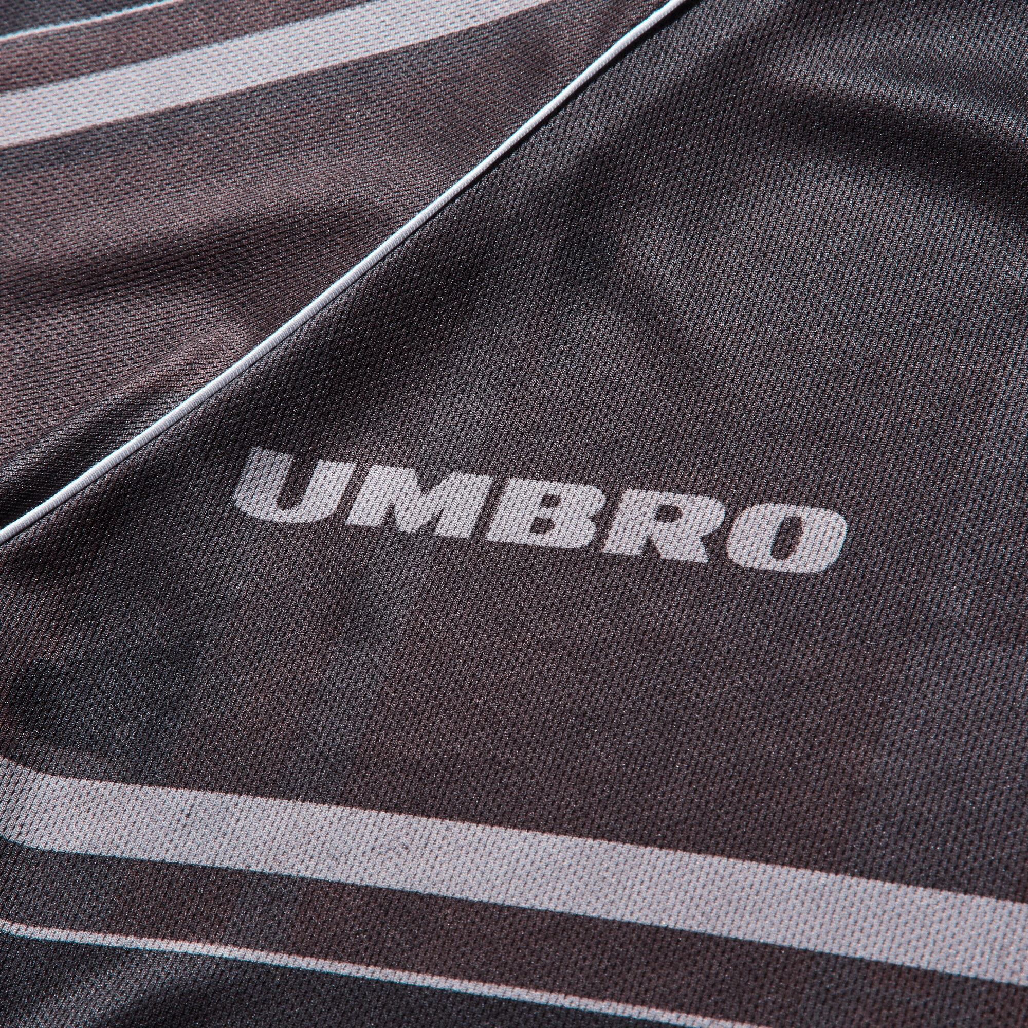 Umbro Distressed Spycam Polo Purple Black